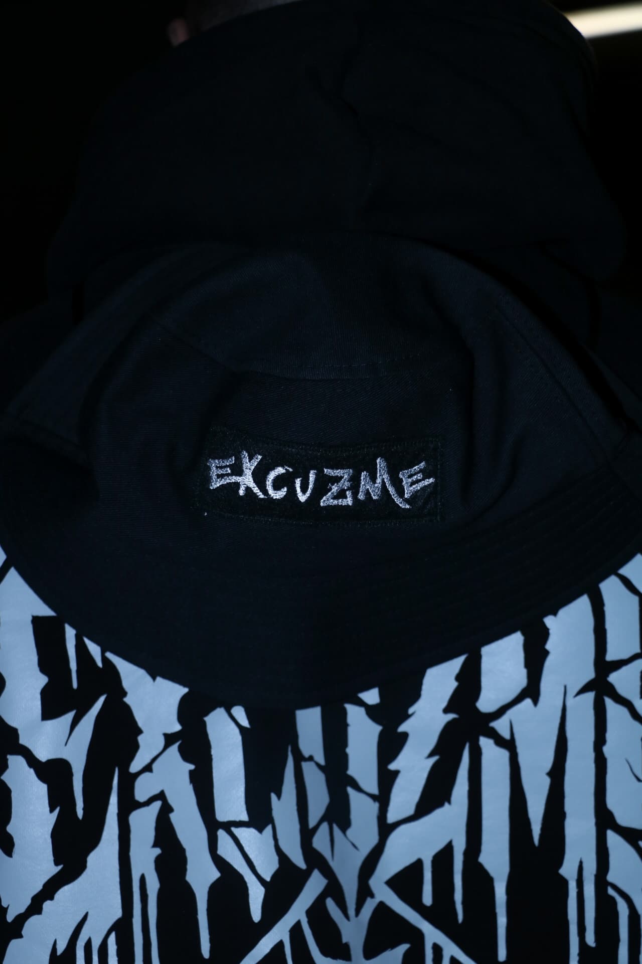Chaos hoodie paired with signature bucket hat.
