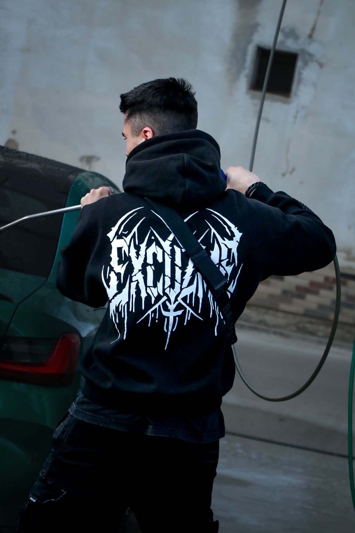 Chaos Backprint hoodie action shot.