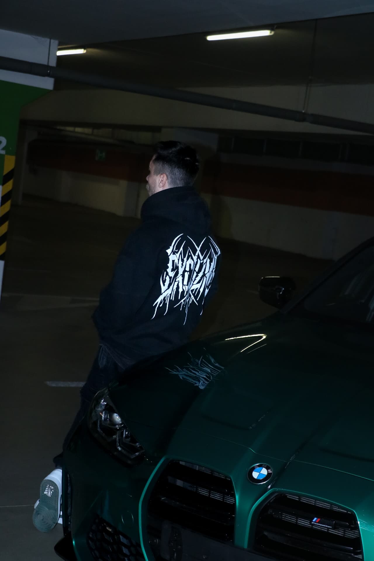 Chaos Backprint hoodie side shot.