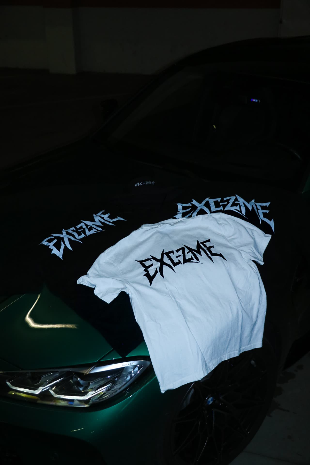 Razor Logo white tee laid out with matching hoodies.